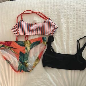 Striped bikini top, black bikini top,and floral bottoms